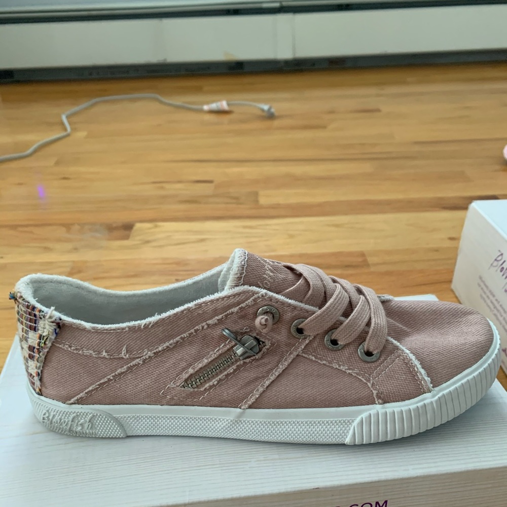 Pink slip on sneakers